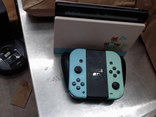 Switch originale avec 2 manettes