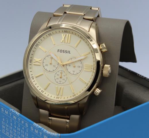 Chronograph fosiil gold tone in bix used