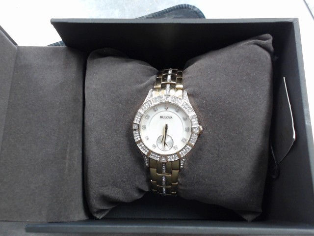 Montre bulova femme dor et diam en boit