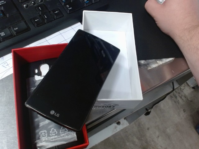Lg g4 phone in box + leather backing