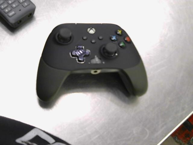 Manette elite a fils