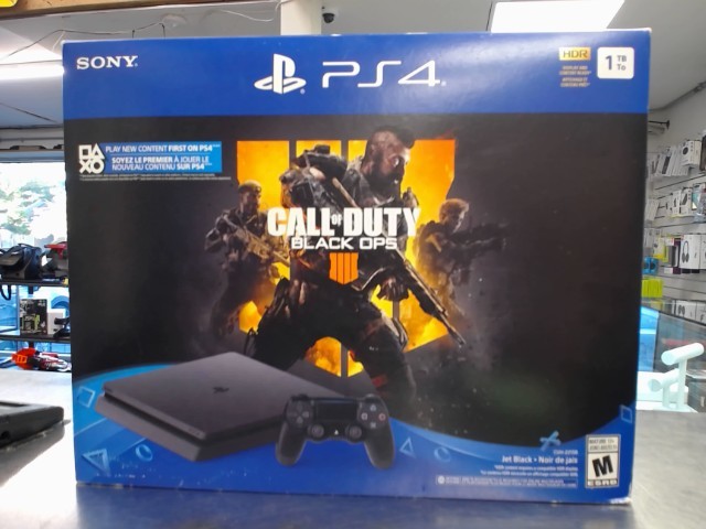 Ps4 slim avec fils et 2 man en boite