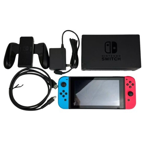 Console nintendo switch + chargeur
