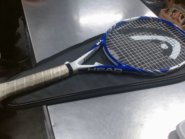 Racquet de tennis head flexpoint
