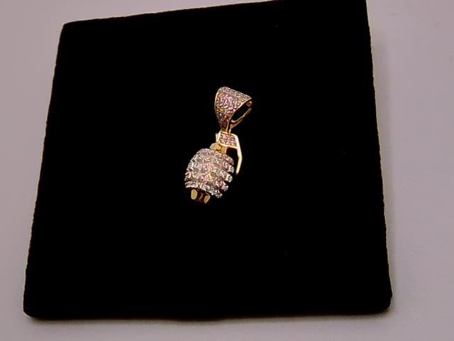 BRELOQUE EN OR 10KT NEW