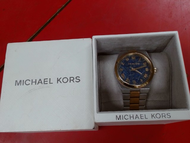 Montre fond bleu argent ds boite