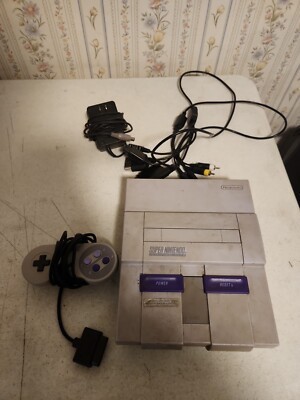Super nintendo 1manette et  fils