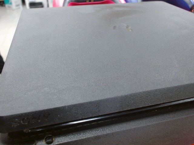 Console ps4 sans alim + 2 jeux