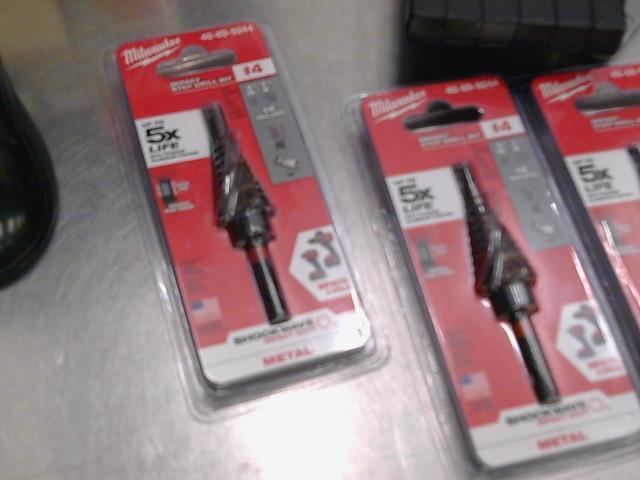 Impact step drill bit