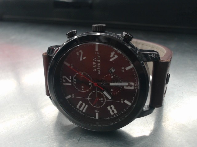 Montre xinew cadran noir bracelet brun