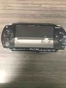 Console psp+acc+2batt dans valise