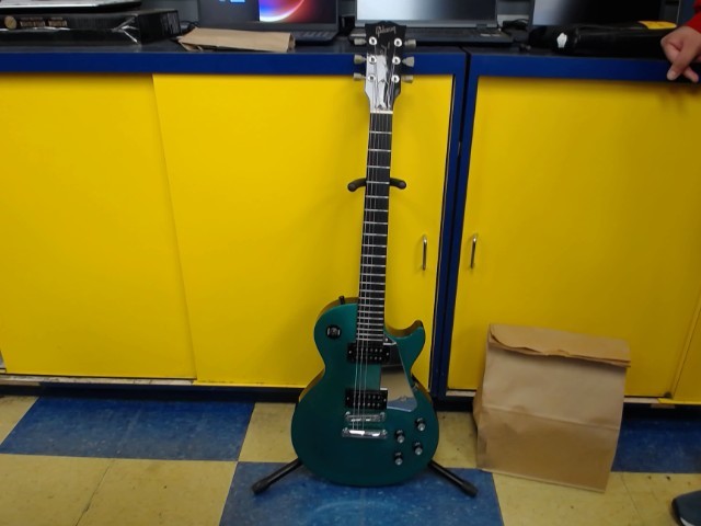 Guitare electrique gibson vert ecarlate