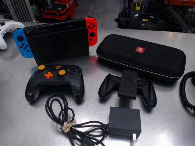Console nintendo switch+acc+man generiqu