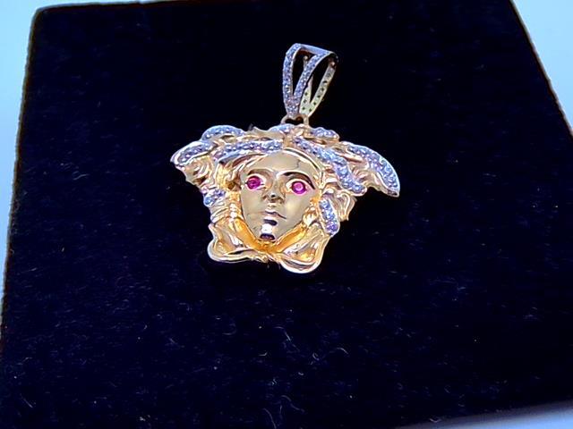 BRELOQUE EN OR 10KT NEW