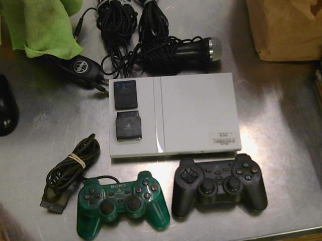 Console ps2 slim avec 2 manette et micro