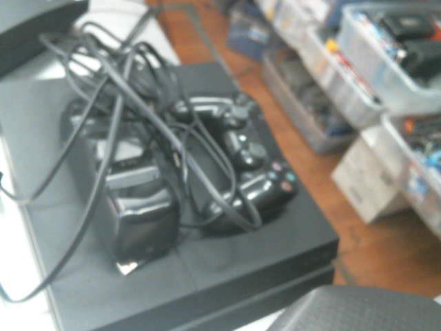 Consle ps4 avec manette et chrgeur