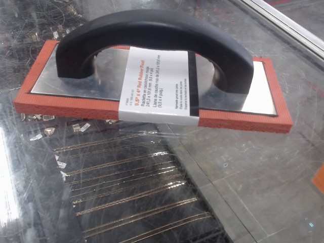 Raclette a coulis en caoutchouc neuf