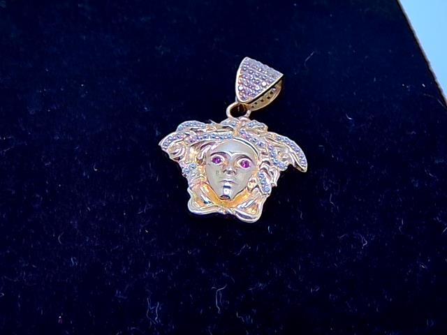 BRELOQUE EN OR 10KT NEW