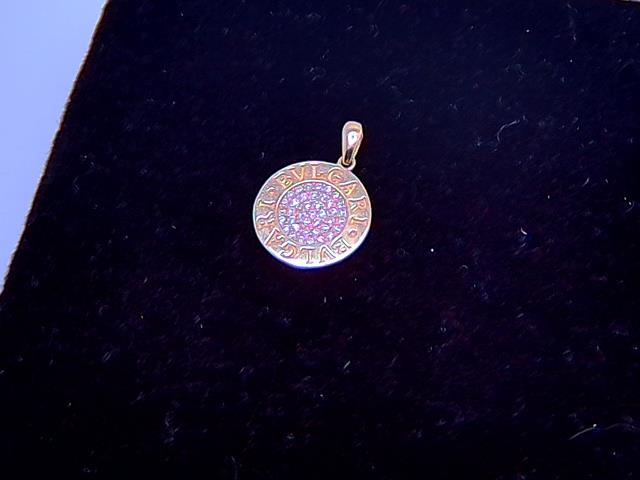 BRELOQUE EN OR 10KT NEW