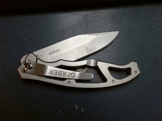 Grey folding knife ok codition