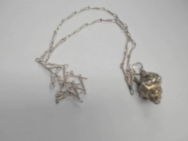 Chaien en argent avc breloque coquillage