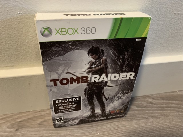 Tomb raider with sleeve and book xbox360