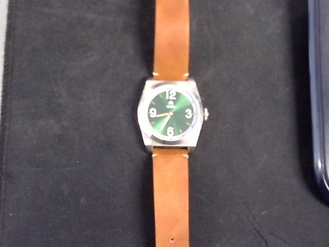 Montre homme quartz + green dial