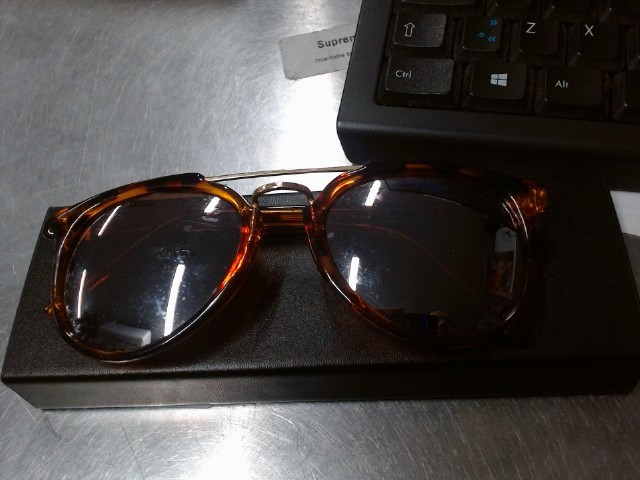 Sunglasses in black case