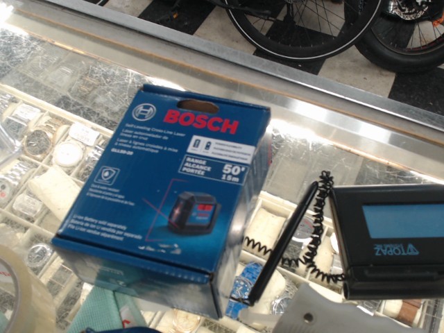 Self-leveling cross-line laser