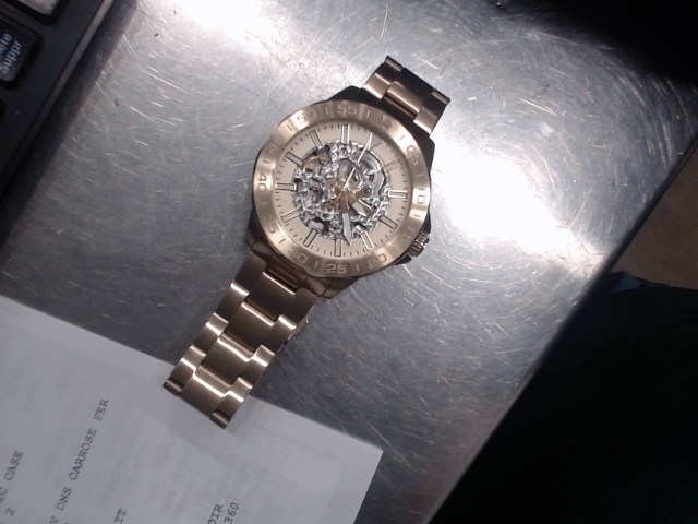 Montre fossil ton or