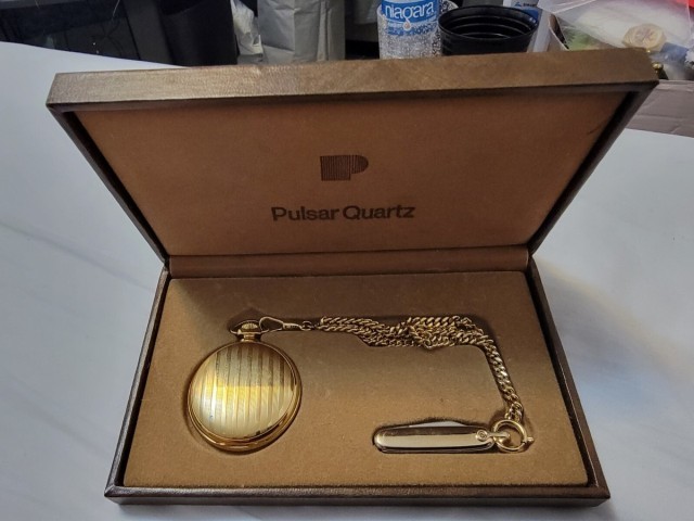 Vintage pulsar gold plated day/date knif