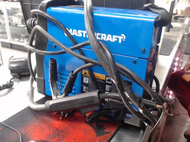 Machine de soudage bleu dans caisse blan