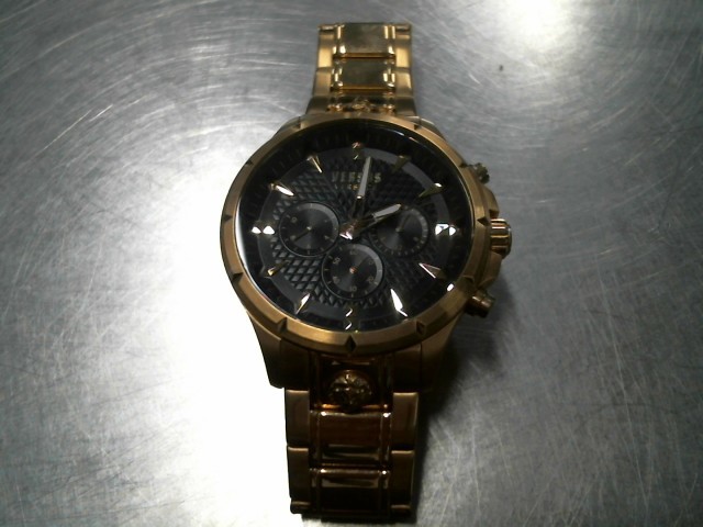 Montre gold tone quartz