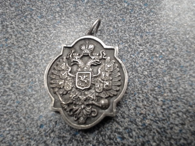 Vieux pendatif religieux en argent