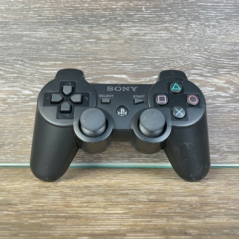 Manette de ps3 avec le chargeur