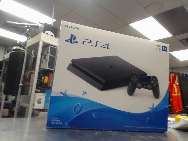 Slim ps4 + man 1tb dans boite