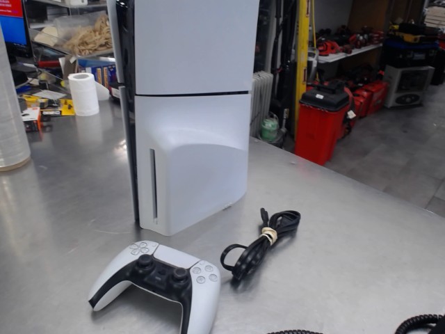 Ps5 slim + disc +man + fil