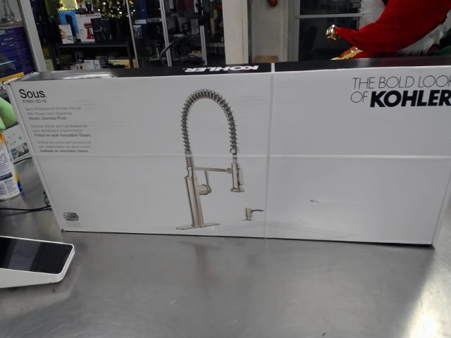 Stainless faucet with soap dispencer
