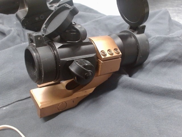 Scope bronze et noir reflex