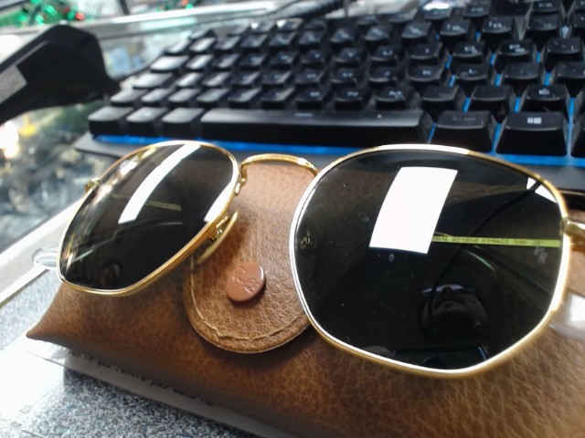 Lunettes rayban couleur or avec case