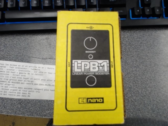 Guitar pedal power booster in box