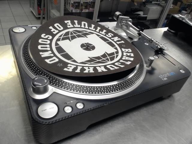 Table tournante avec file et aiguille