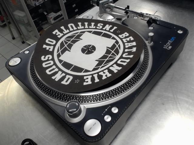 Table tournante avec file et aiguille