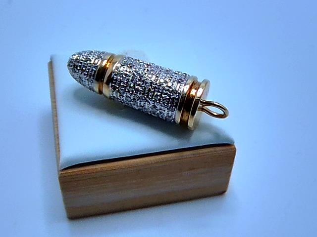 BRELOQUE EN OR 10KT   DI