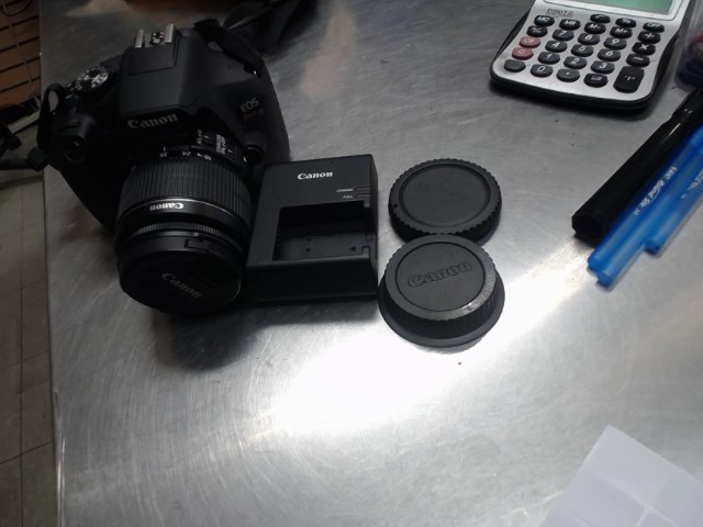 Camera dig 24 lentille 18-55 add