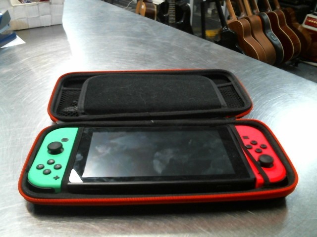 Switch joycon rose et vert no dock/charg