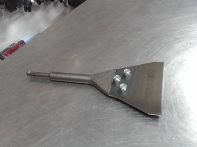 Racleur de couvre plancher