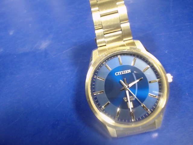 Montre dor�e comme neuve