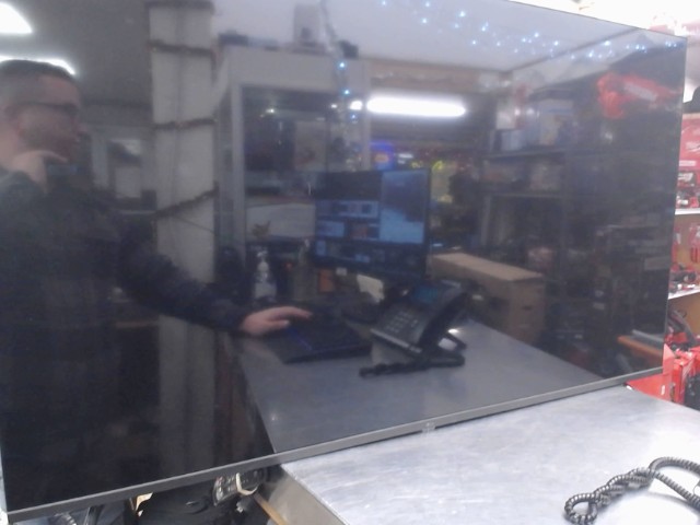 Tv 4k uhd + man + fil