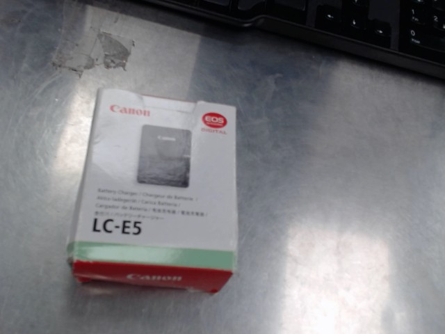 Canon eos cgharger and battery canon